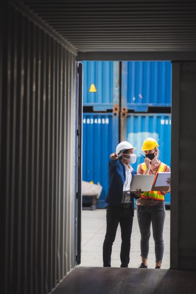executives businessmen, and engineers or foreman wear medical face masks